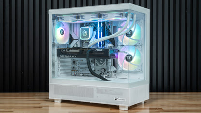 PowerGPU Aurora RTX 5080 gaming PC, white case with RGB lighting on a wood floor