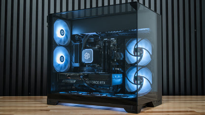 PowerGPU Nox RTX 5070 gaming PC, black case with blue LED fans on a wood surface