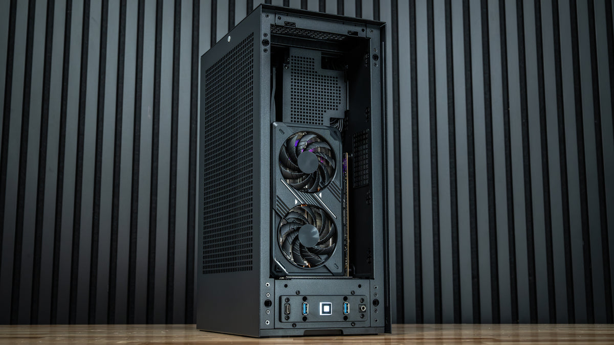 VAPOR CHAMBER RX 9060 XT Gaming PC – angled view on desk