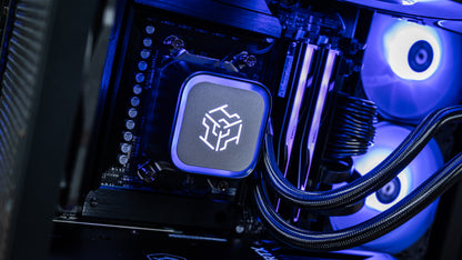 Detail of the 360mm liquid CPU cooler pump head with braided tubing and DDR5 RAM inside the PowerGPU Azul AMD Ryzen RTX 5090 gaming PC